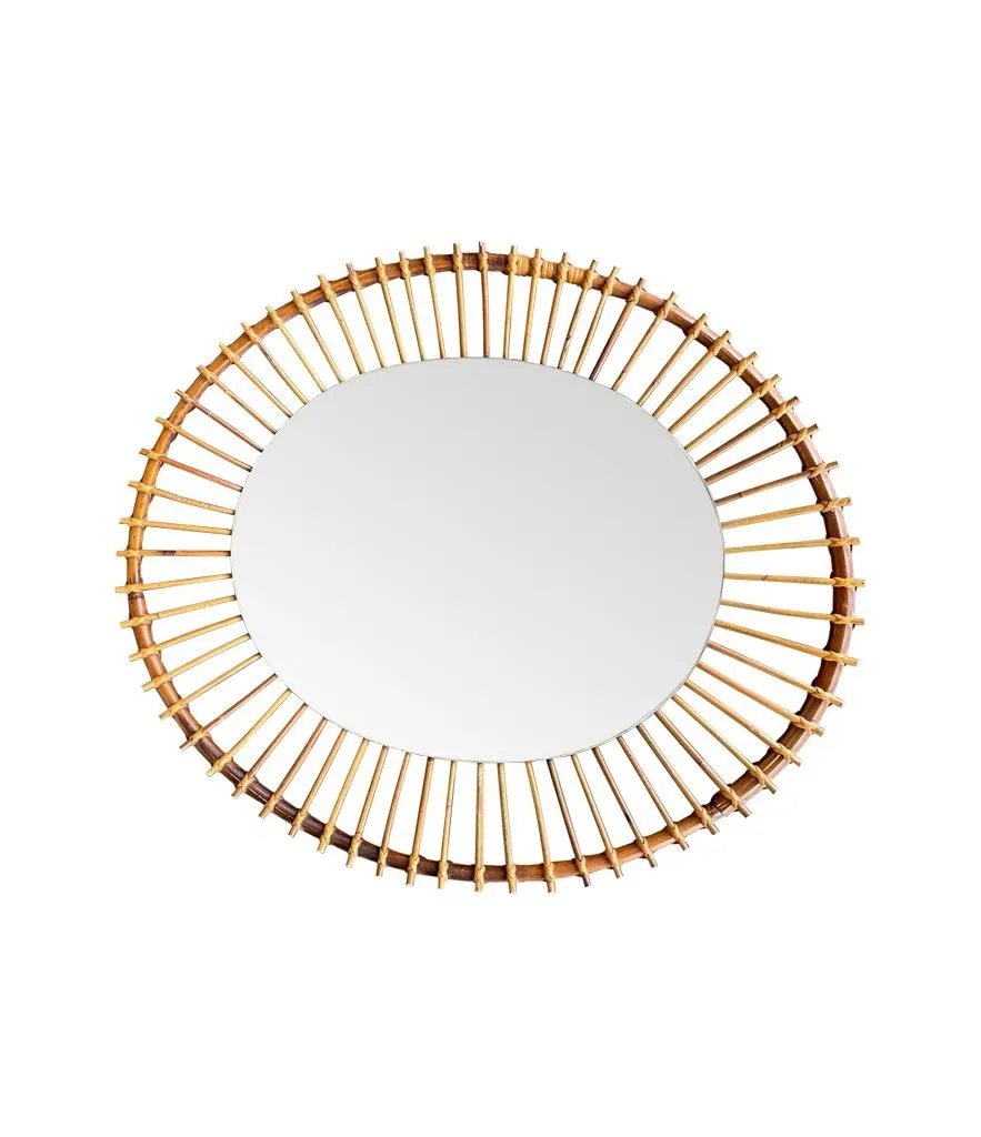 A 1970s Italian oval pencil reed bamboo mirror with original mirror plate fixed with brass circular fittings