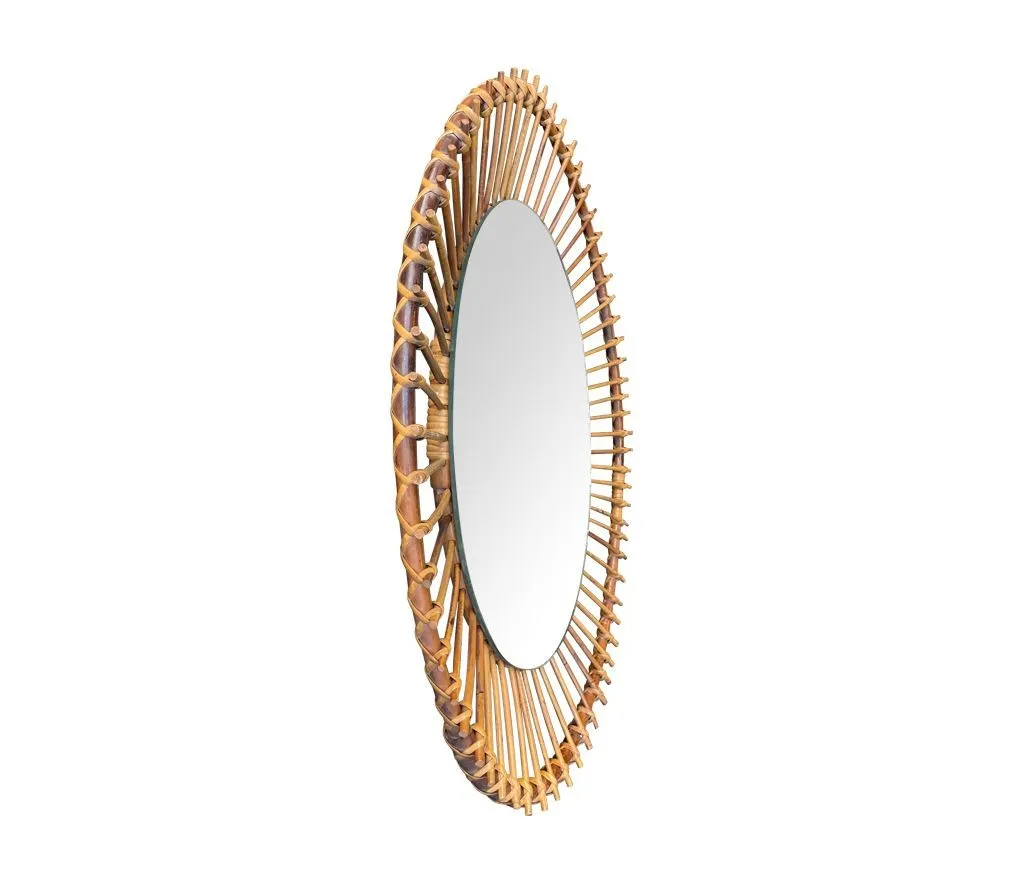 A 1970s Italian oval pencil reed bamboo mirror with original mirror plate fixed with brass circular fittings