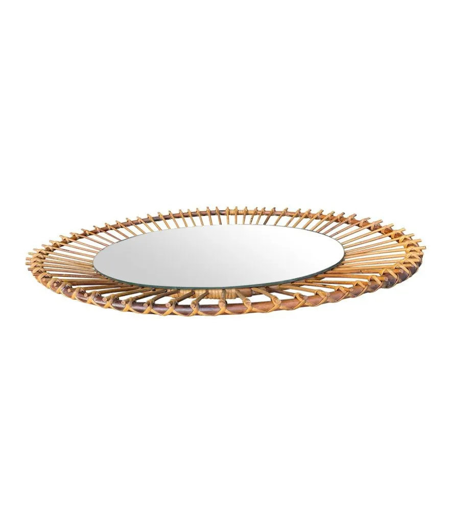 A 1970s Italian oval pencil reed bamboo mirror with original mirror plate fixed with brass circular fittings